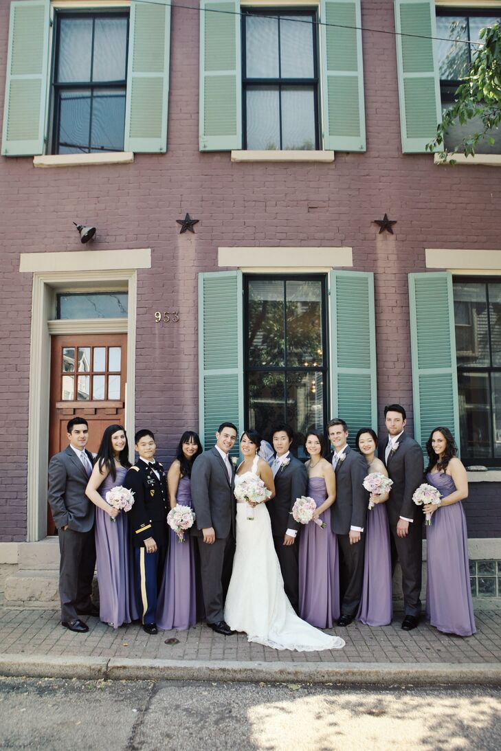The bridesmaids wore strapless, flowy purple dresses, while the guys matched the groom in dark-gray suits.