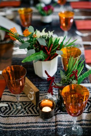 Low Natural Centerpieces and Orange Stemware
