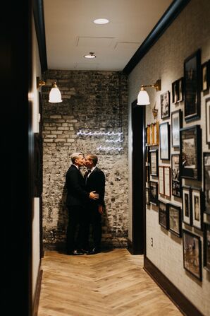 Grooms Share a Kiss at Wedding at The Oxford Exchange