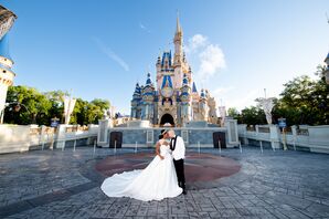 Bride in Ballgown and Groom in White-and-Black Tux, Cinderella Castle at Walt Disney World
