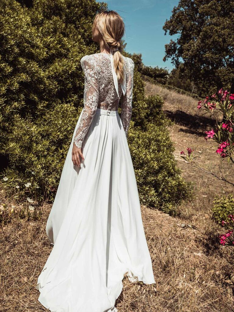 Model wears a wedding dress by French designer Caroline Takvorian. 