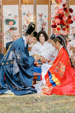 Groom Pouring Tea During Traditional Korean Paebaek Ceremony