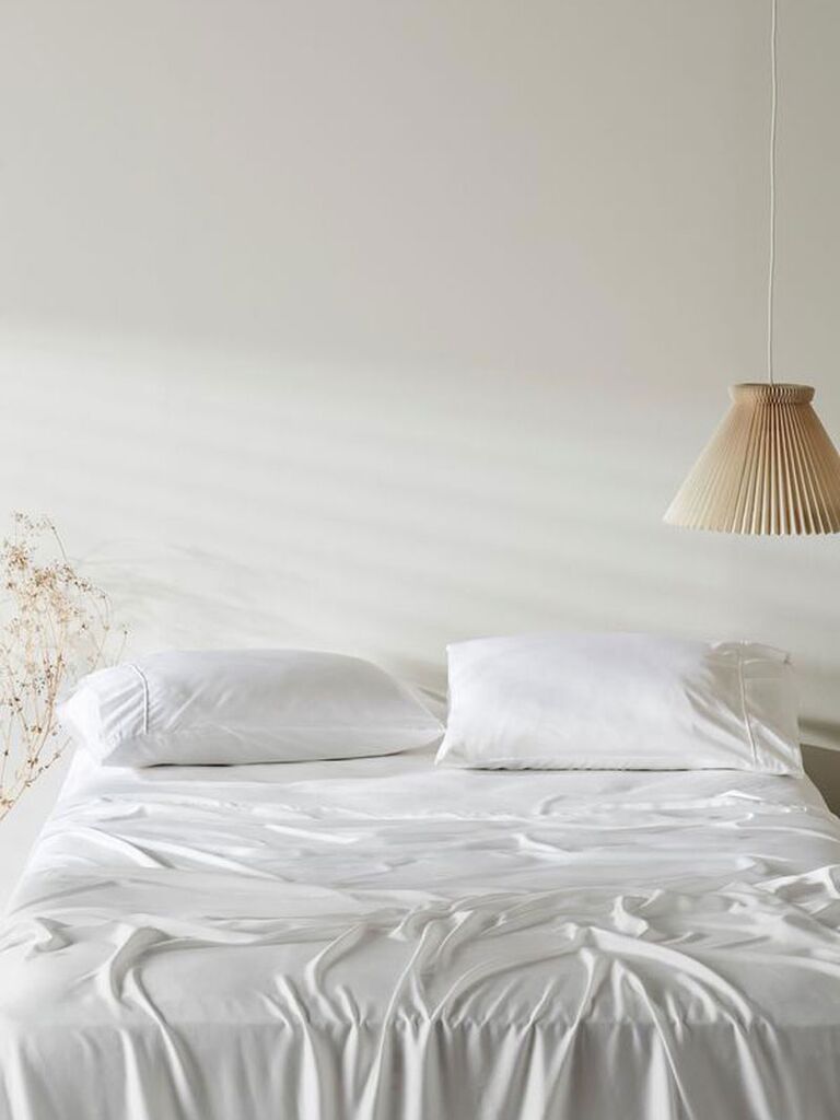 Bamboo sateen white sheets on unmade made