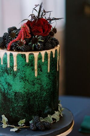 Green Wedding Cake With Gold Drips and Berry Garnishes