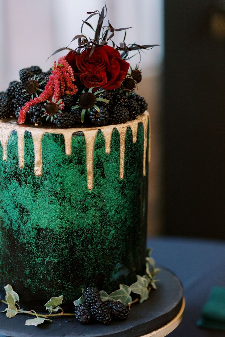 Green Wedding Cake With Gold Drips and Berry Garnishes