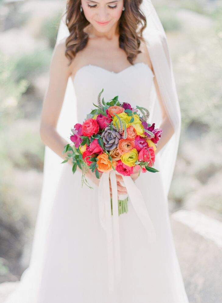 A stunning blue sky, giant cactus and oversized boulders served as Mother Nature's contribution to Kelsey Rudy (25 and an accountant) and Mason Rudy's