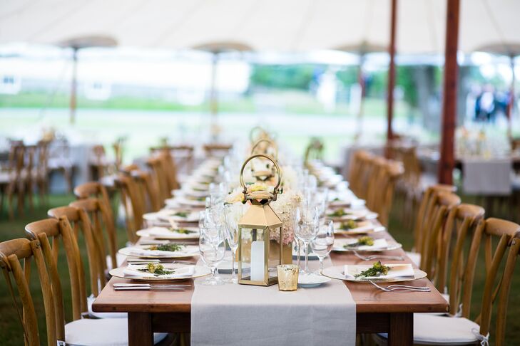 “The decor was intended to be simple, elegant and romantic,” Caitlin says. “We wanted the colors to be soft and beautiful. I really wanted the wedding to glow with the lights and flowers.” Caitlin and Mike decorated the open tent with rustic family-style tables, gold lanterns and low floral centerpieces.