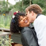 Bride and groom share a happy moment together at their wedding