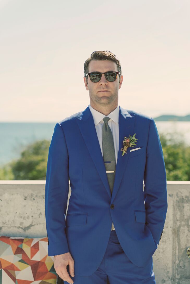 "We wanted a look that reflected not only the energy of the island but also us as individuals," Diana says. "Meaning nothing too traditional, too bridal, too formal." Stephan picked a bright, bold blue suit to match the blue waters.