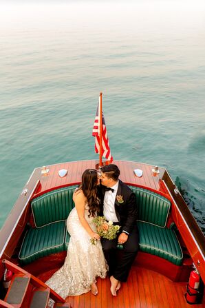 Bride and Groom in Boat on Lake Tahoe