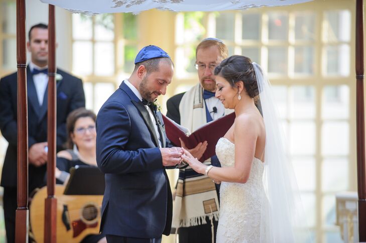 The couple exchanged vows under a chuppah that Lauren’s grandfather made himself many years ago and hand-sewn canopy made from Lauren’s mother’s wedding dress. Following tradition, the pair incorporated the Seven Blessing and the breaking of the glass into the ceremony.