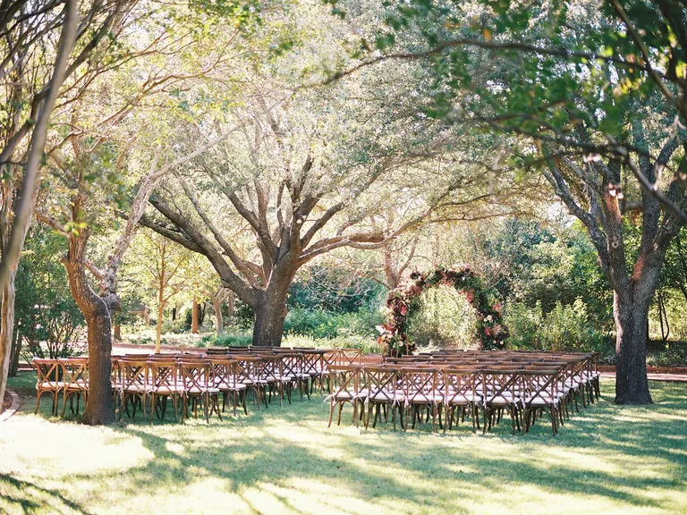 Woodland Garden Wedding Ceremony With Wood Chairs