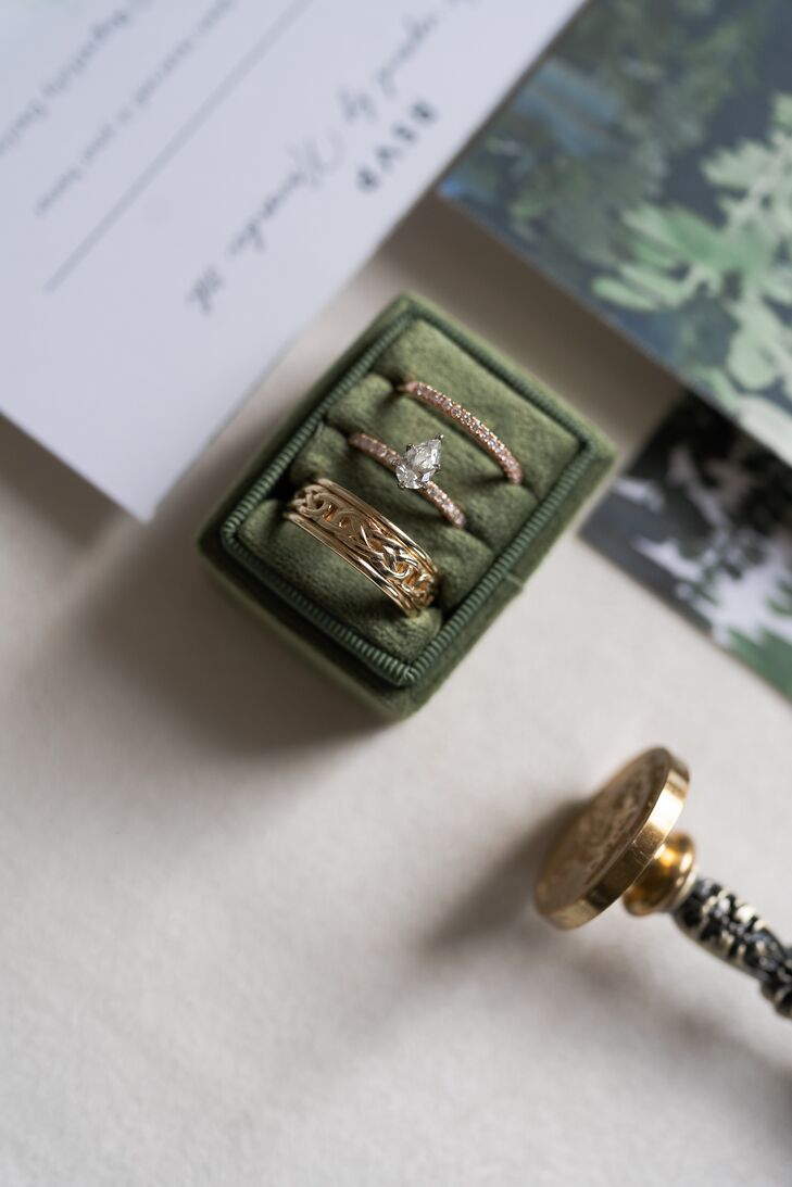 Green Ring Box With Unique Men's Band, Pear-Shaped Diamond Ring and Diamond Band