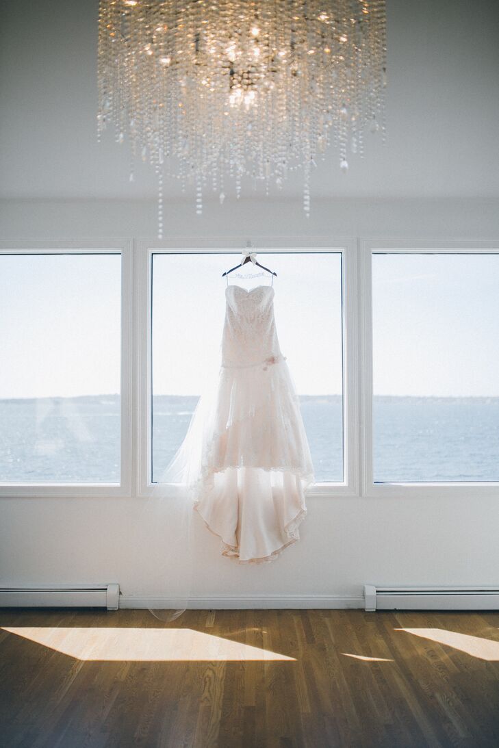 The bride's strapless lace dress, by David Tutera for Mon Cheri, featured a subtle tinted blush hue.