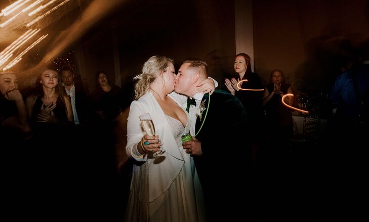 Couple Shares Kiss During Wedding at The Space HTX in Houston, Texas