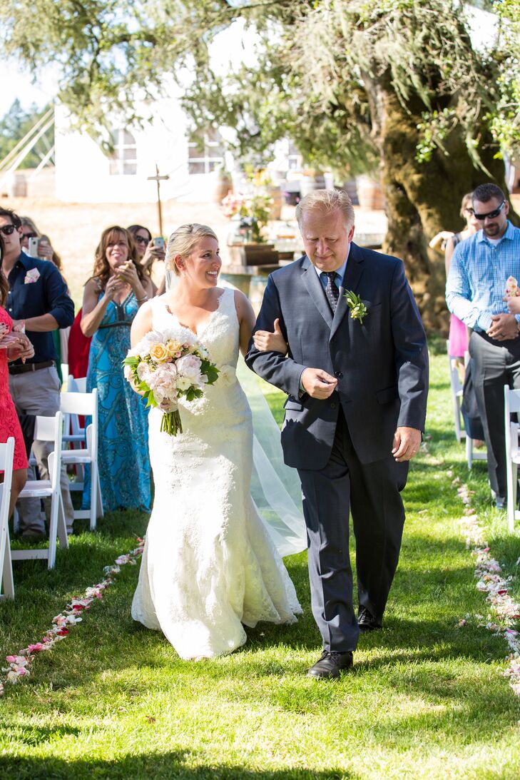 Allyson was led by her father down the grassy, rose-petal aisle to the shady spot under a majestic old tree where she would say "I do."