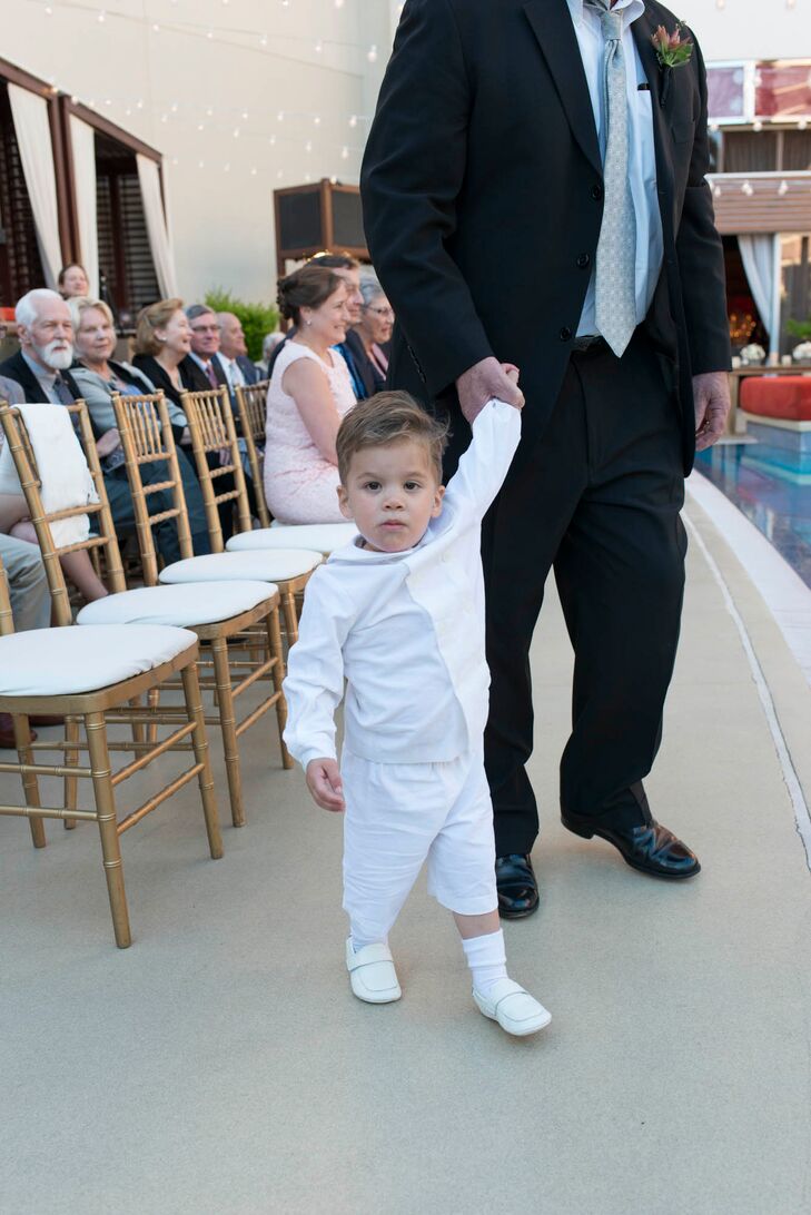 "We had the opportunity to get married after having our kids. We wanted the wedding to be a celebration of not just us as a couple but of our family. So we included them throughout the ceremony and our vows spoke about them," the grooms say of their children.