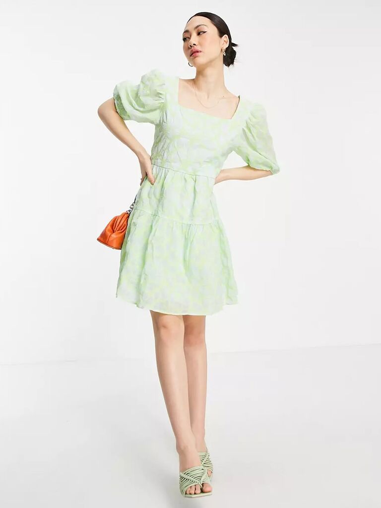 asos mint green pastel mini dress for wedding guests with puffy short sleeves low back and flowy skirt
