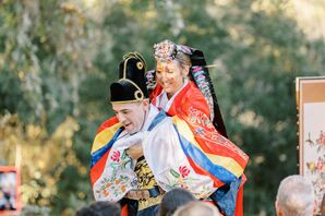 Groom Giving Bride a Piggyback Ride, Traditional During Korean Paebaek Ceremony