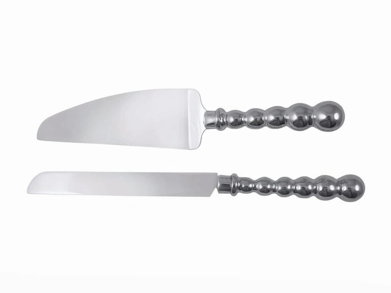 Silver cake cutting set with textured handles by Mariposa. 