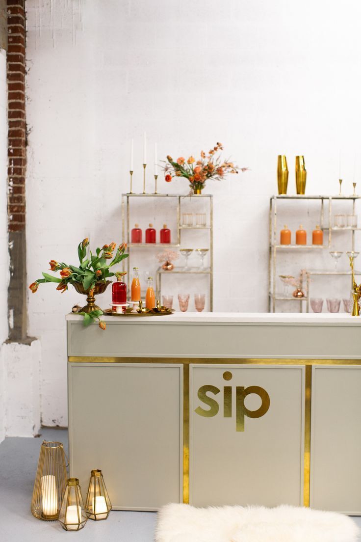 Modern bar front with gold lettering
