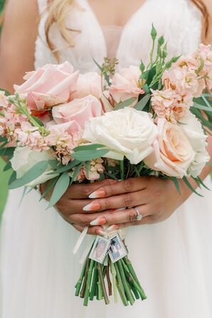 Bride With Ornate Ombre Nails Holding Bouquet With Picture Charms