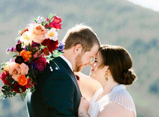 To celebrate their love, Kate and Andrew planned a colorful wedding at Northstar Gatherings in Idaho Springs, <a href="https://www.theknot.com/content