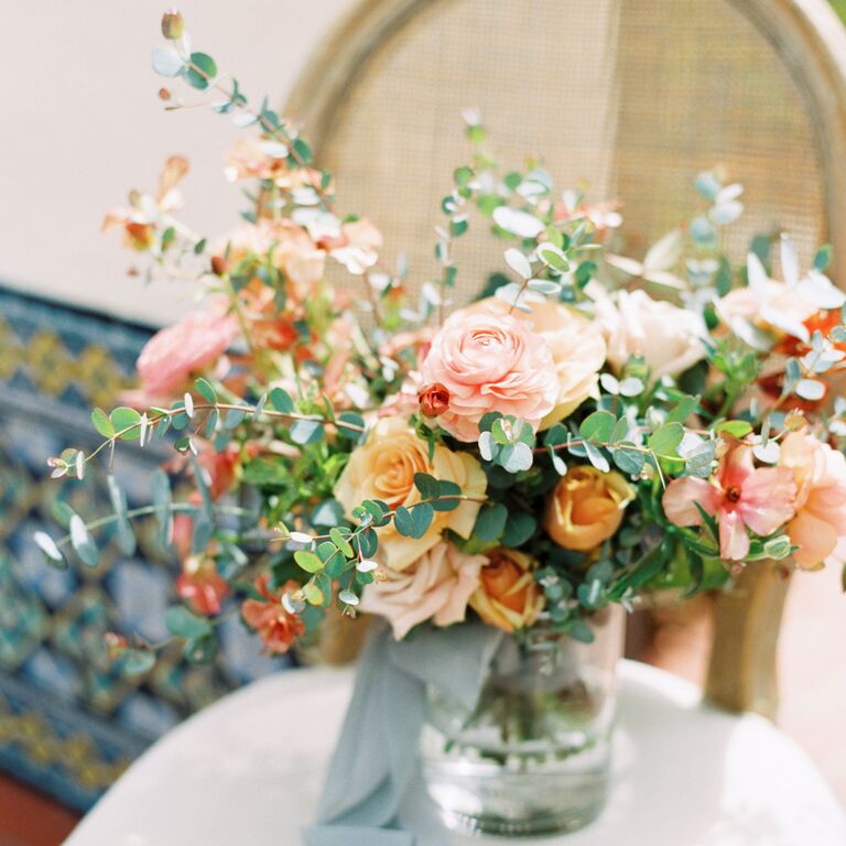 Fresh flower wedding bouquet with eucalyptus and roses