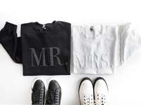 Mr. and Mrs. matching couples' sweatshirts in black and white. 