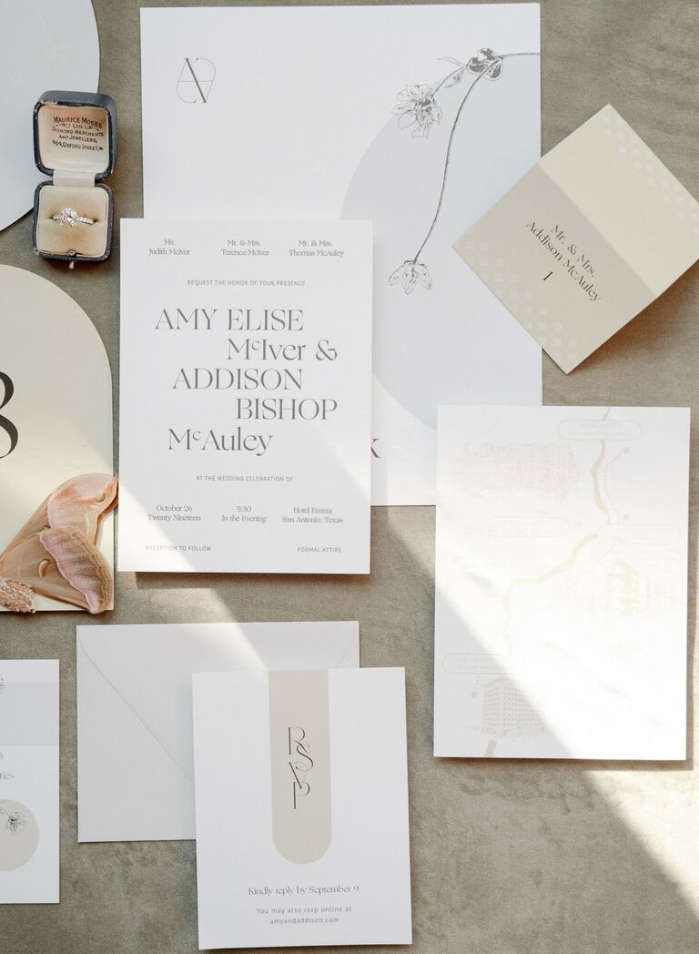 Modern white wedding invitation with serif typeface