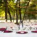 The rustic centerpieces varied from lanterns to wooden boxes finished by the bride and her mother. "For our decor, we bought and built locally, as our families value local businesses and do our best to support our community," says Victoria.