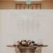 Modern Metal Sweetheart Table With Black Rug and Velvet Chairs