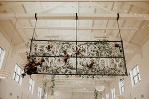Hanging Sign Decorated With Greenery at BLDG 177 in San Diego, California