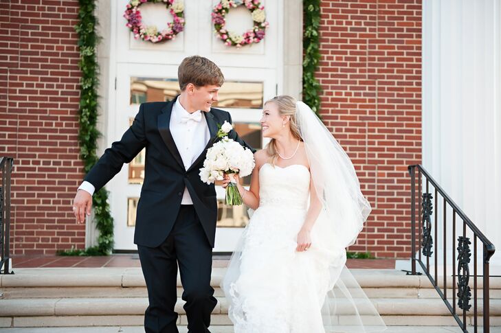 Sara Beth and Trae exchanged vows at a large, traditional ceremony and celebrated their wedding with lots of florals, two delicious cakes and vintage overtones.