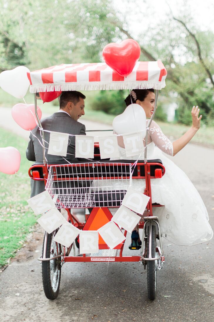 Jennifer and Justin took their love of biking to a whole level. They made their grand exit on a surrey bike with a "just married" banner and heart balloons. Who needs a getaway car when you can tandem bike?!