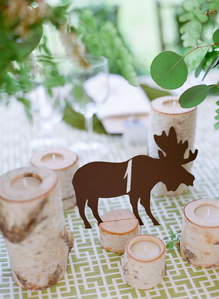 Animals, representing the wildlife of Jackson Hole, Wyoming, decorated each table, and miniature antlers adorned the guests' place cards.