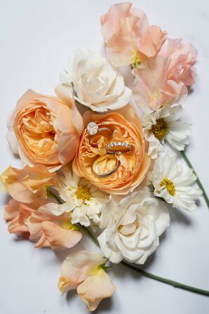 Diamond Engagement Ring Nestled in Orange Garden Rose