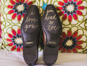 Wedding shoes with messages on the bottom