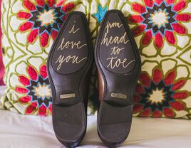 Wedding shoes with messages on the bottom