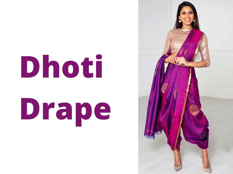 Tia Bhuva wearing a purple saree in a dhoti drape style. 