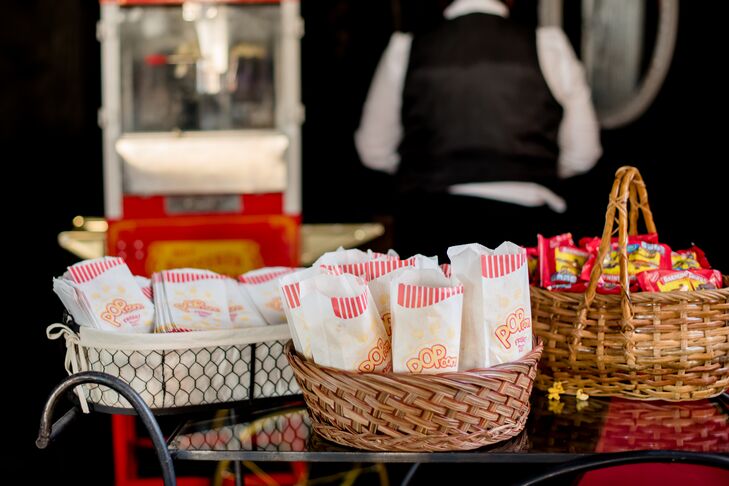 A popcorn station with old-fashioned popcorn bags provided snacks for guests throughout the evening at Inn at the Old Silk Mill in Fredericksburg, Virginia.