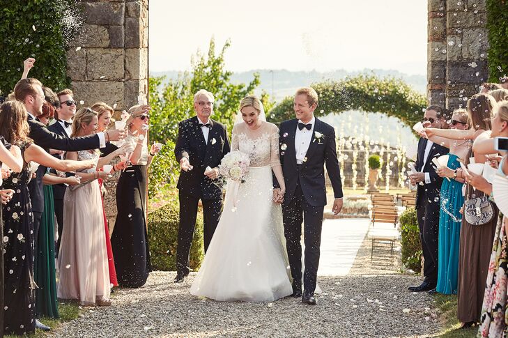 Guests threw paper cones of rose petals during the processional.