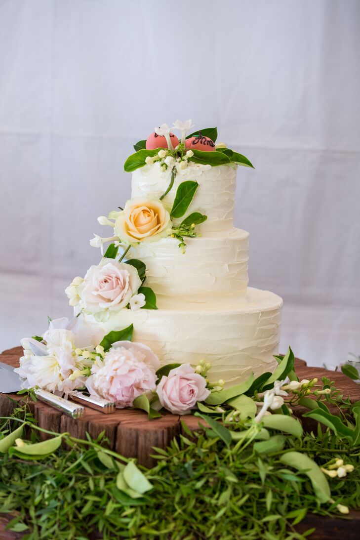 Three-Tier Buttercream Wedding Cake with Cascading Flowers