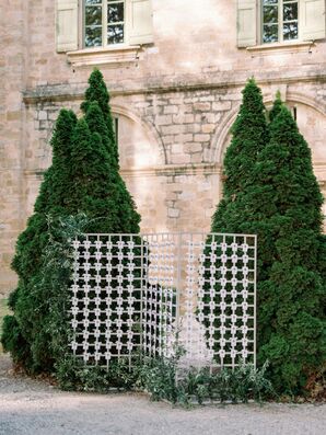 Elegant Escort Card Display With Gold Wax Seals, Ample Greenery at French Venue