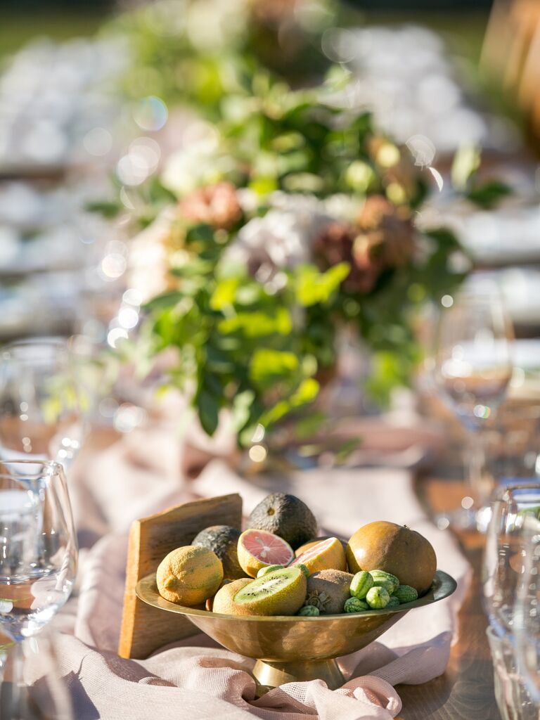 Kiwi fig citrus wedding centerpieces with silverware
