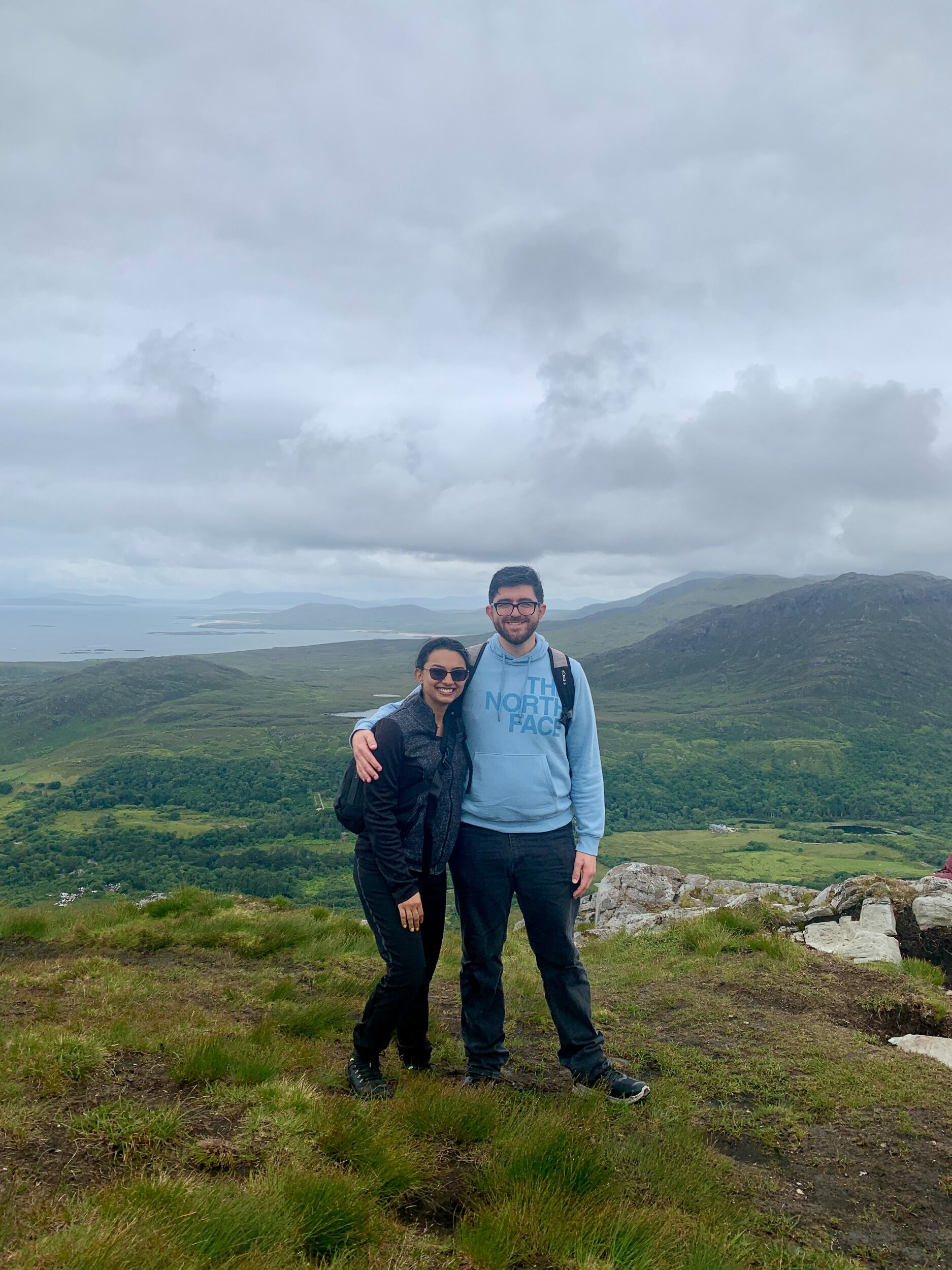 Picture of We love the outdoors and traveling! Here we are at the top of a mountain in Ireland