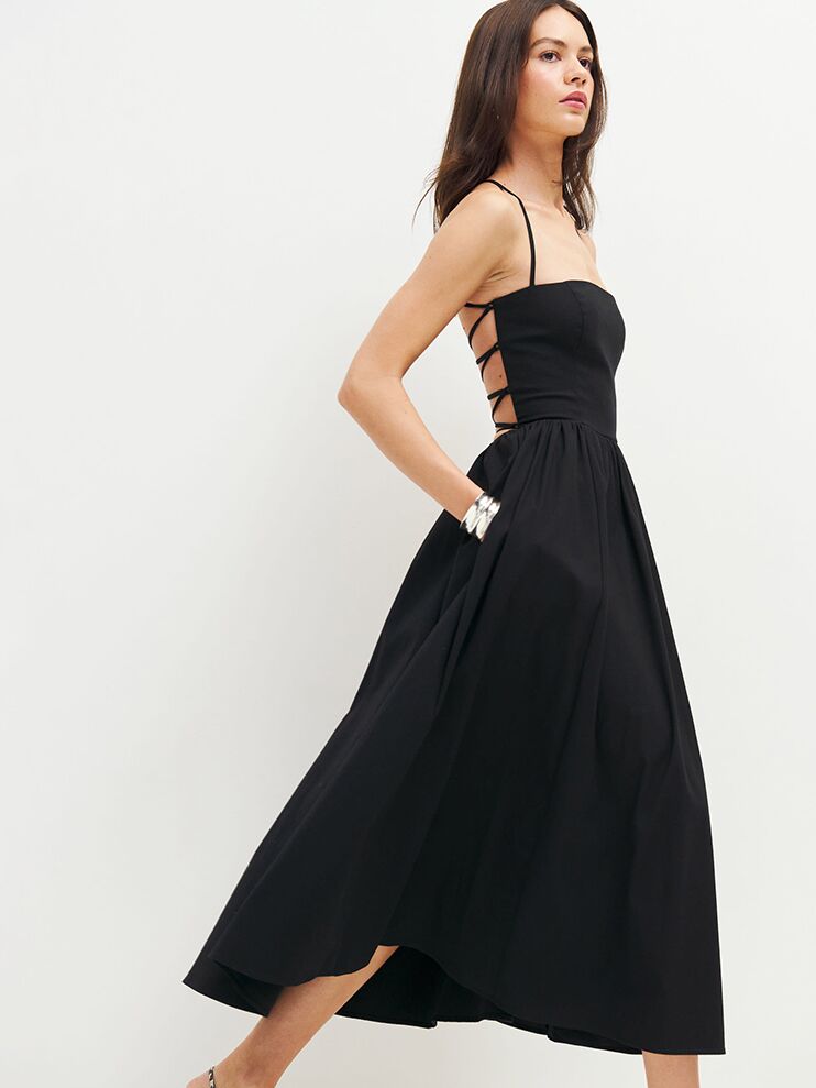 Black A-line midi dress with open back from Reformation