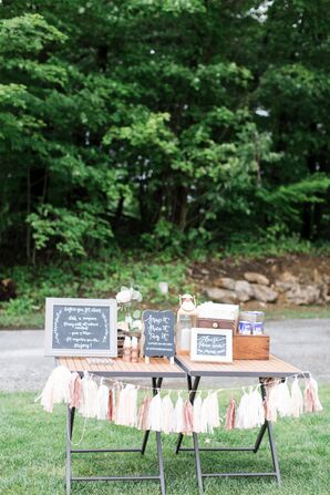 Ceremony Welcome Table With Pom-Pom Banner