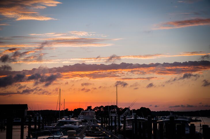 The bride and groom chose the Nauticus Marina in Osterville, Massachusetts out on the cape because of the amazing views, where their guests could enjoy the ocean and sunset during the reception.