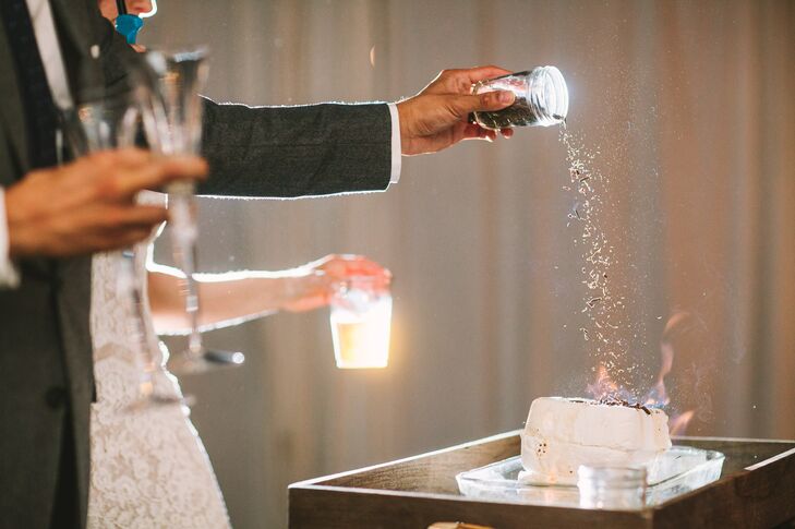 Megan and Ray made their own s’more wedding cake and lit it on fire! They sprinkled chocolate shavings on top for a melted chocolate glaze. Yum!